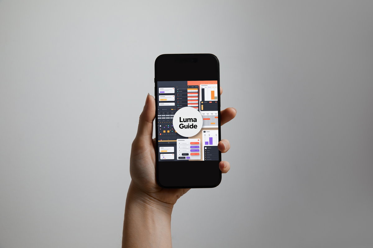 A hand holds a black smartphone against a plain light gray background. The phone screen displays a UI design mockup with a central white circle reading 'Luma Guide'.
